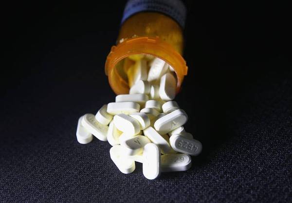 From 2006 through 2014, more than 100 billion doses of oxycodone and hydrocodone were distributed nationwide, according to federal drug data. (John Moore/Getty Images)&nbsp;