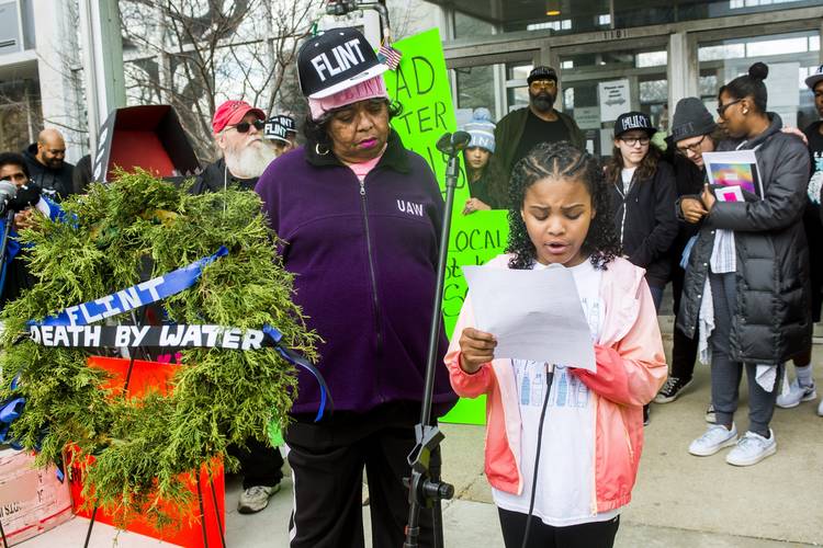 Mari Copeny, a 10-year-old better known as Little Miss Flint, speaks as more than 60 people protest on the four-year anniversary of the start of the city's water crisis on April 25 outside city hall in Flint, Mich. (Jake May/Flint Journal-MLive.com/AP)