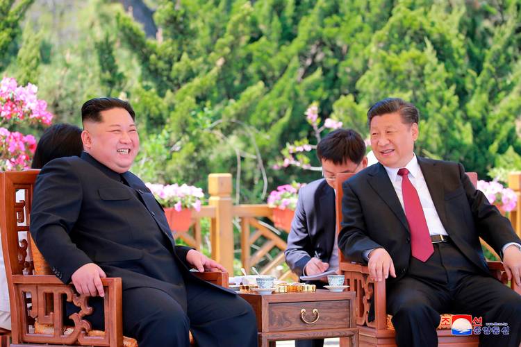 North Korean leader Kim Jong Un meets Chinese President Xi Jinping in Dalian, China, in May. (Korean Central News Agency/Korea News Service via AP, File)
