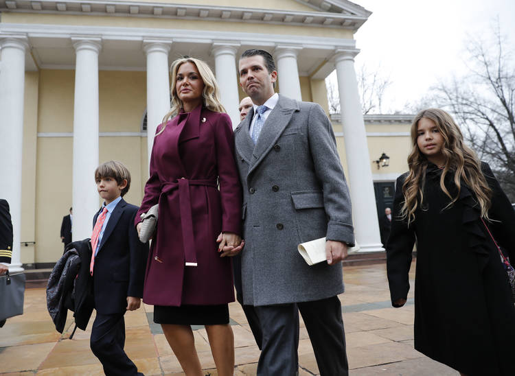 Donald Trump Jr. and Vanessa Trump walk out of a church service with their children. (Pablo Martinez Monsivais/AP)