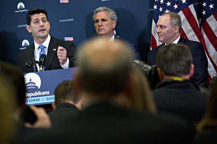 Ryan speaks as House Majority Leader Kevin McCarthy and House Majority Whip Steve Scalise listen during a news conference. (Andrew Harrer/Bloomberg)