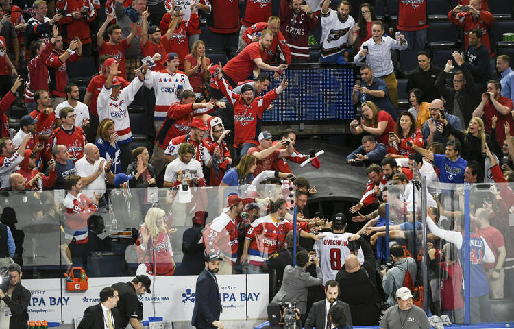 Washington Capitals left wing Alex Ovechkin walks into the locker room after winning the eastern conference finals in Tampa last night. (Jonathan Newton/The Washington Post)