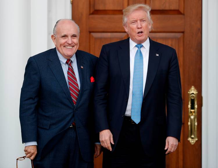 Donald Trump and former New York mayor Rudy Giuliani pose for photographs at the Trump National Golf Club in Bedminster, N.J. (Carolyn Kaster/AP)