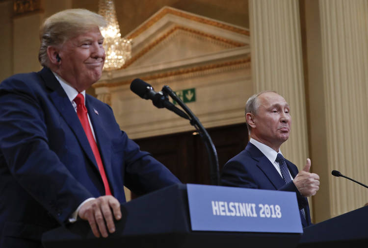 President Trump and Russian President Vladimir Putin speak last week at a news conference in Helsinki. (Pablo Martinez Monsivais/AP)