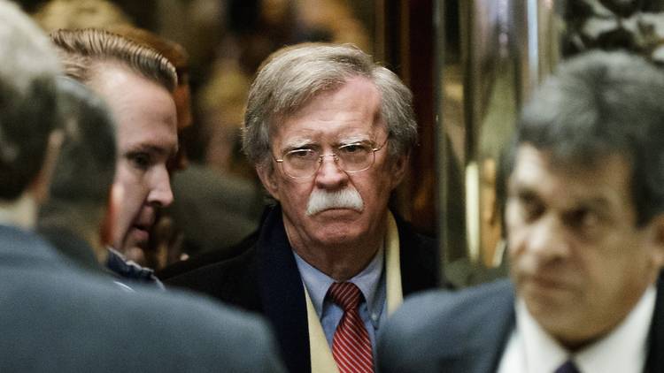 John Bolton stands in the elevator at Trump Tower.(Justin Lane/Pool/Bloomberg News)