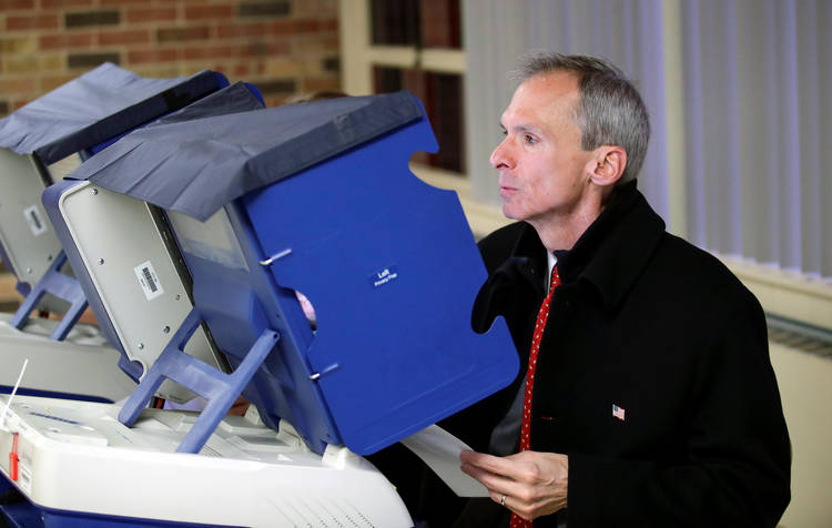 Rep. Dan Lipinski (D-Ill.) votes for himself. (Kamil Krzaczynski/Reuters)