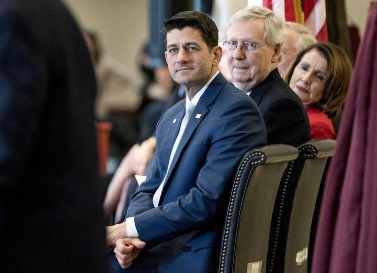 Paul Ryan, Mitch McConnell and Nancy Pelosi attend a Congressional Gold Medal Ceremony honoring the Office of Strategic Services in Emancipation Hall on Wednesday. (Andrew Harnik/Associated Press)