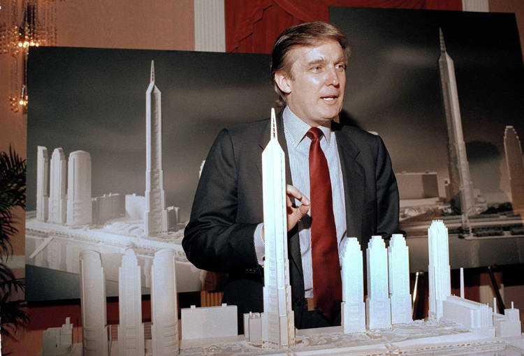 Donald Trump displays an artist's concept of a development in 1985. (Marty Lederhandler/AP)
