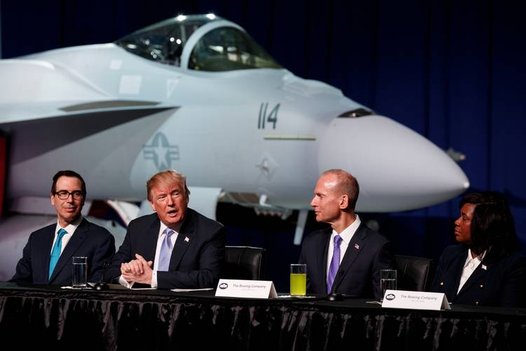 President Trump speaks during a roundtable discussion on tax policy last month at the Boeing Company in St. Louis. (Evan Vucci/AP)