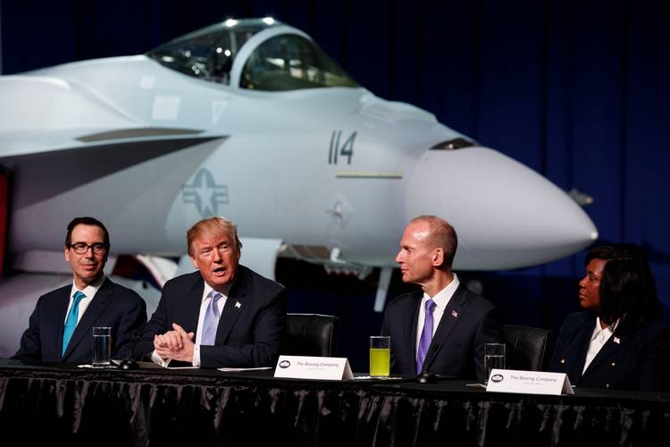 President Trump speaks during a roundtable discussion on tax policy last month at the Boeing Company in St. Louis. (Evan Vucci/AP)