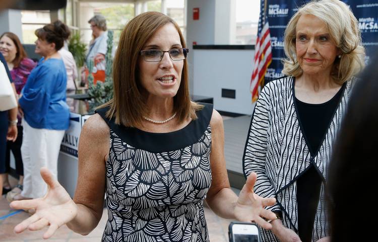 Rep. Martha McSally (R-Ariz.) speaks to reporters after a news conference at a campaign event in Phoenix. (Ross D. Franklin/AP)