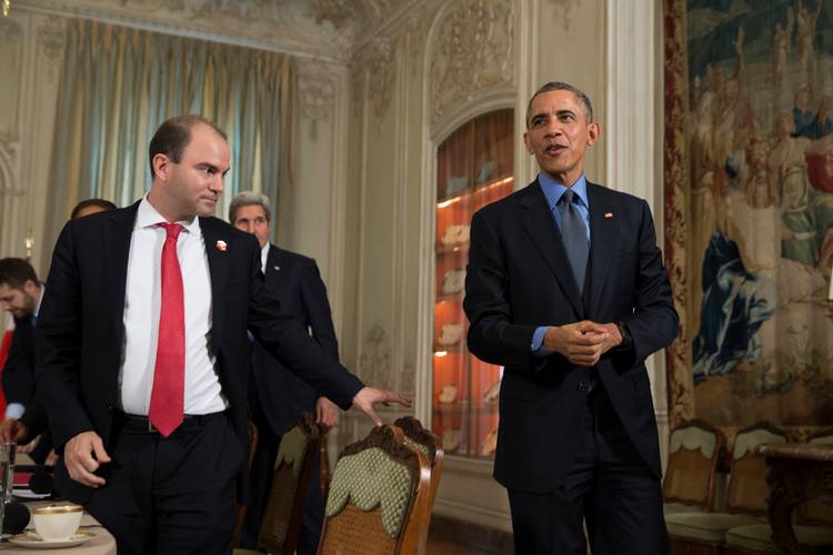 President Barack Obama departs a meeting with Turkish President Recep Tayyip Erdogan in Paris in 2015, flanked by Ben Rhodes. (Evan Vucci/AP)