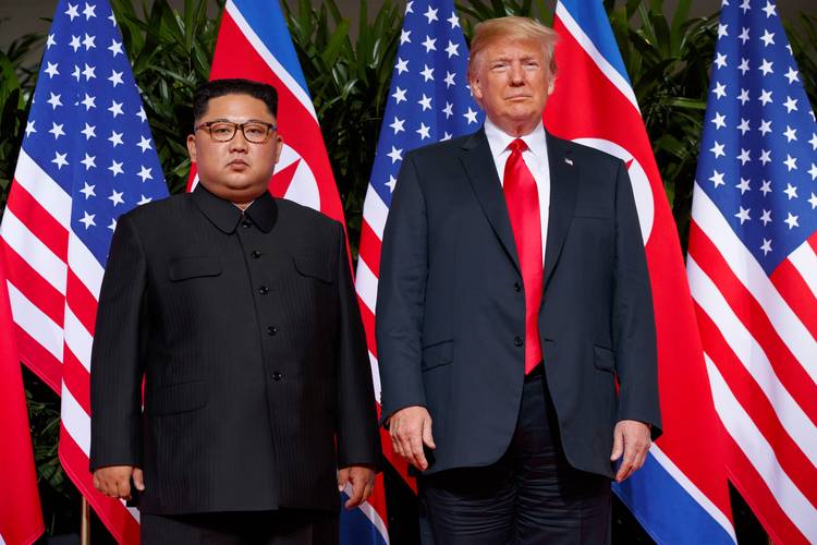 President Trump meets with North Korean leader Kim Jong Un in Singapore. (Evan Vucci/AP)