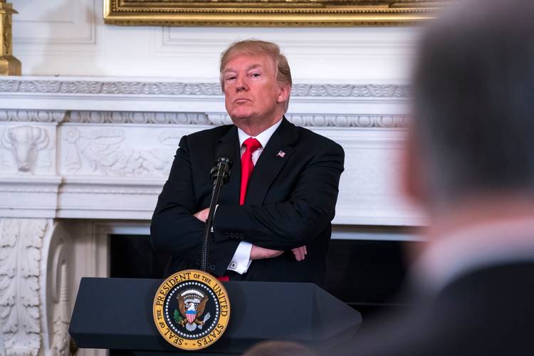 President Trump listens to Gov. Jay Inslee (D-Wash.) speak against his plan to arm teachers during a meeting with the nation's governors at the White House. (Jim Lo Scalzo/European Pressphoto Agency)