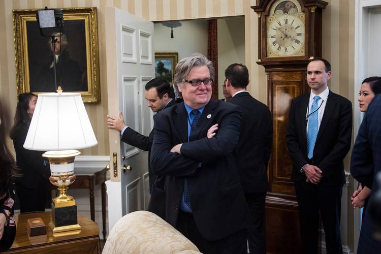 Then-chief strategist Steve Bannon listens during an executive order signing ceremony. (Jabin Botsford/The Washington Post)