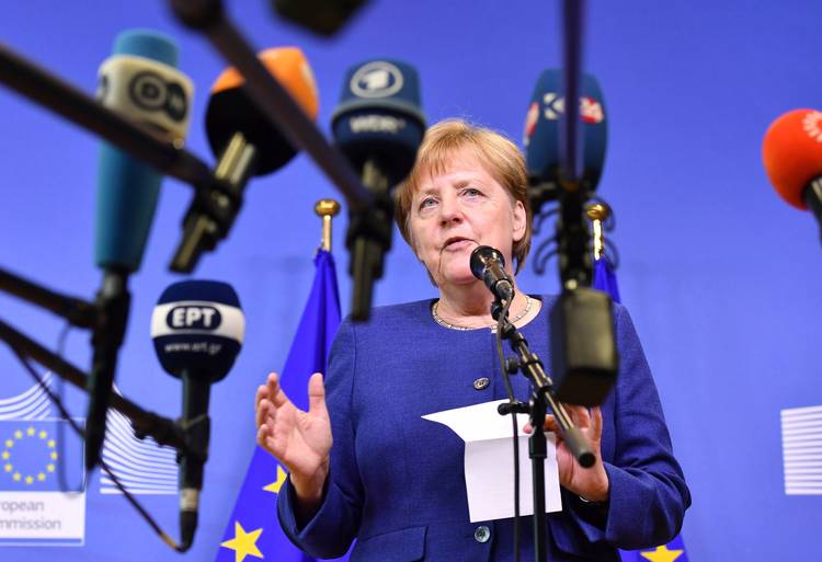 German Chancellor Angela Merkel speaks with the media at the conclusion of an informal E.U. summit on migration. (Geert Vanden Wijngaert/AP)