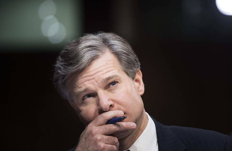 FBI Director Christopher Wray appears before the Senate Intelligence Committee. (Melina Mara/The Washington Post)
