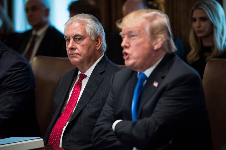 Then-Secretary of State Rex Tillerson listens as President Trump speaks during a Cabinet meeting last December. He was fired three months later. (Jabin Botsford/The Washington Post)