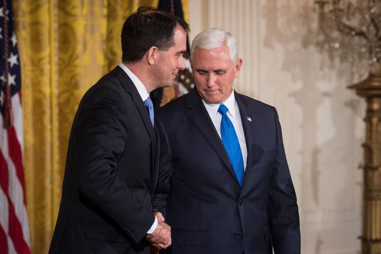 Wisconsin Gov. Scott Walker shakes hands with Vice President Pence at the White House. (Jabin Botsford/The Washington Post)