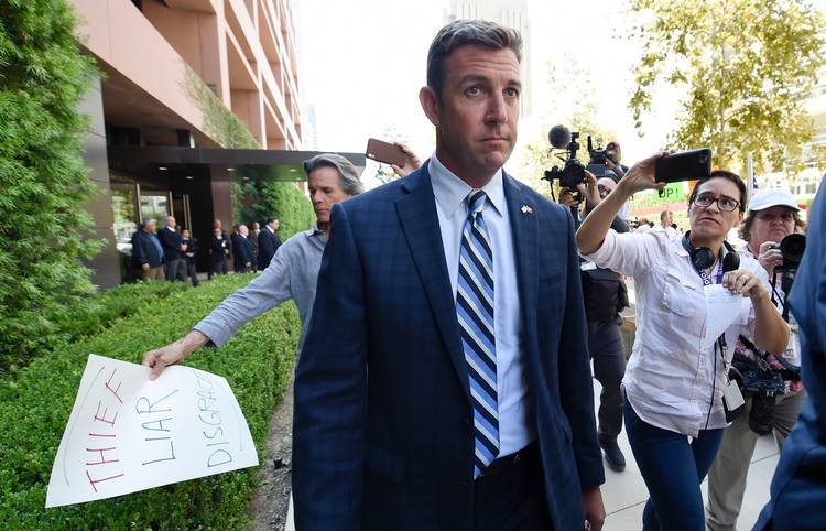 Rep. Duncan D. Hunter (R-Calif.) leaves an arraignment hearing in San Diego. (Denis Poroy/AP)