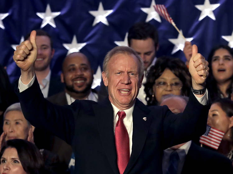 Illinois Gov. Bruce Rauner addresses supporters on Tuesday night after winning the Republican nomination for a second term. (Nam Y. Huh/Associated Press)