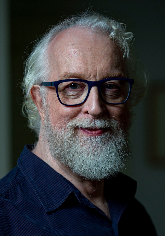 A person with a beard and glasses</p>
<p>Description automatically generated with medium confidence