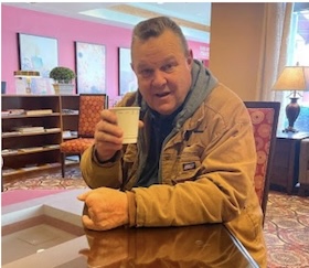 Jon Tester having coffee