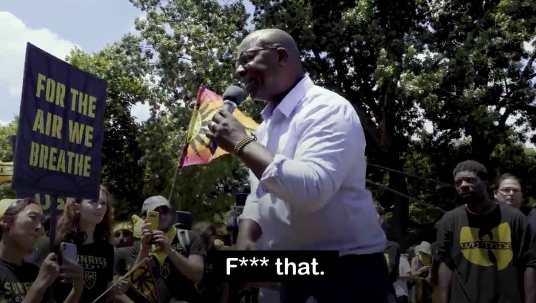 Picture of Jamaal saying 'F--- that' at a Sunrise Movement rally