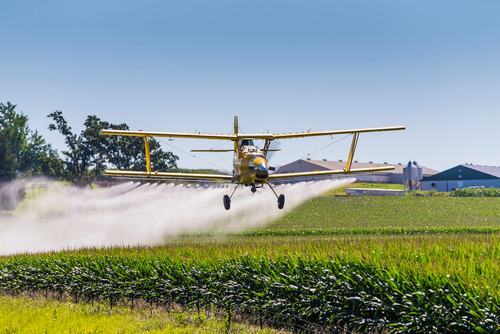 Plane spraying pesticide