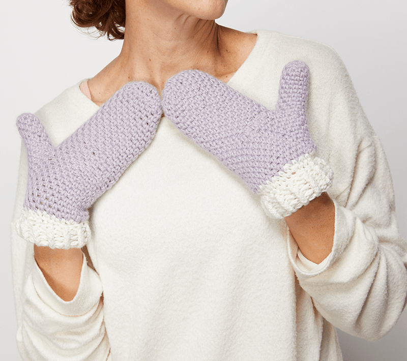 These crochet mittens are so easy to put together. The free crochet pattern is really easy to follow and youâ€™ll end up with a snuggly pair of gloves. #CrochetMittens #CrocheGloves #CrochetAddict #FreeCrochetPattern