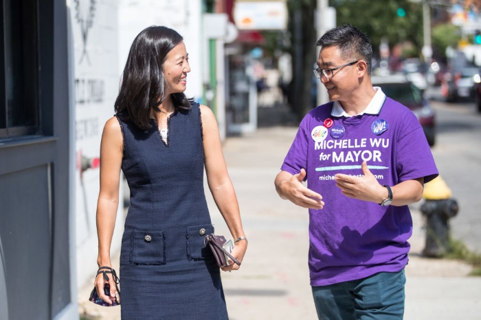 Nightly 11-1-21 photo 2 Boston mayoral candidate City Councilwoman at-large Michelle Wu talks with a campaign worker.