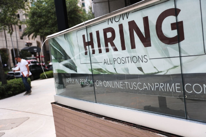 GettyImages-1146752608 (1).jpg A Now Hiring sign in Fort Lauderdale, Fla.
