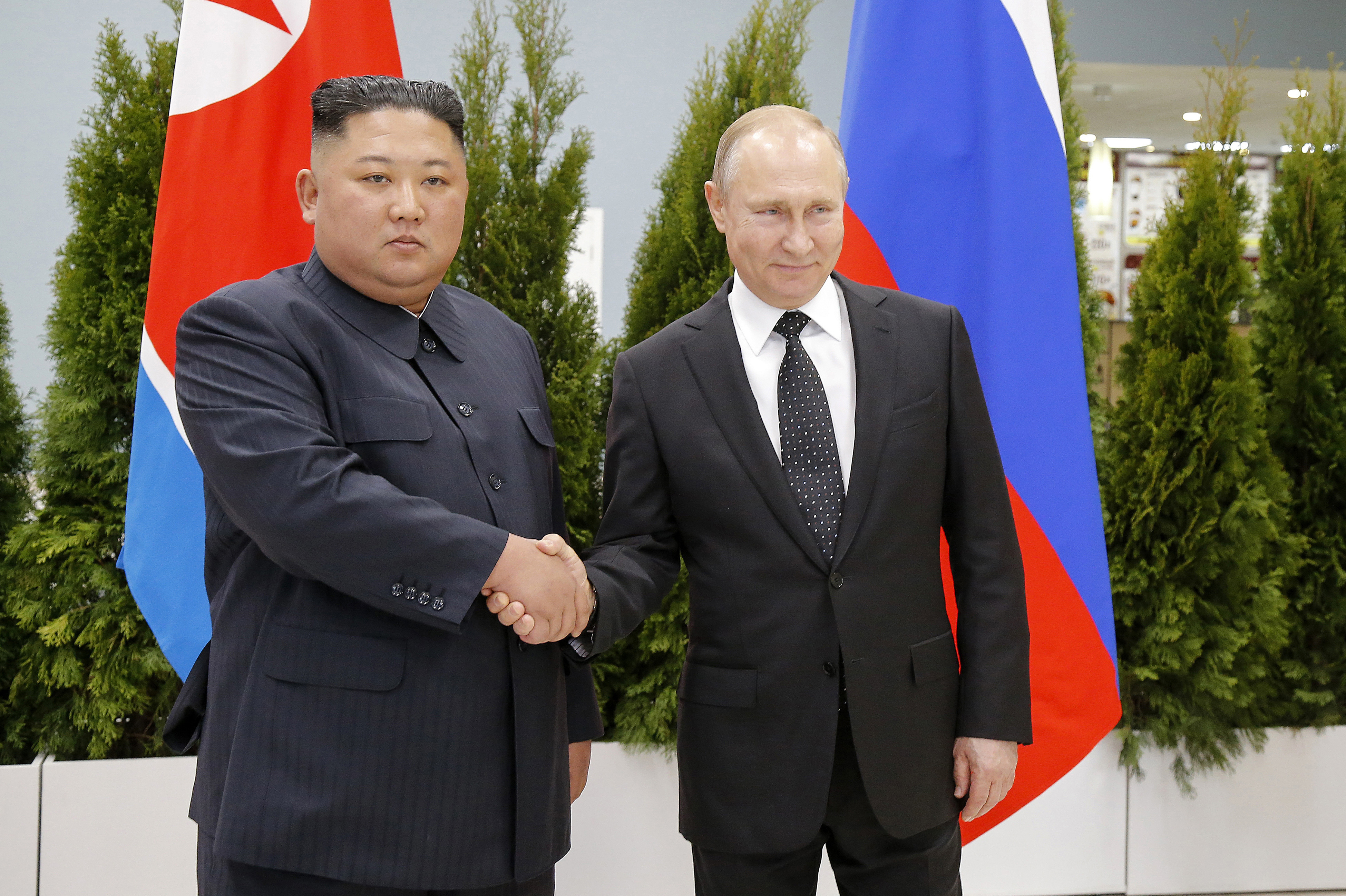 A photo of Kim Jong-Un and Vladimir Putin. 