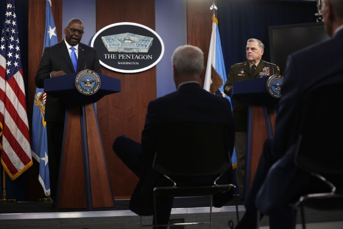 Nightly 7-21-21 photo 2 U.S. Secretary of Defense Lloyd Austin (L) and Chairman of Joint Chiefs of Staff Gen. Mark Milley (R) participate in a news briefing at the Pentagon.
