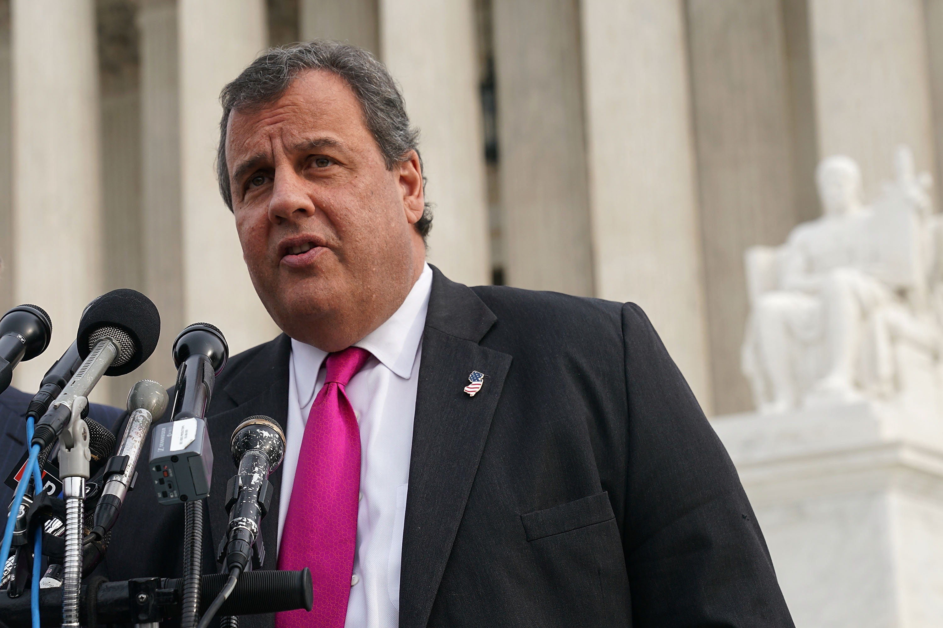 Chris Christie speaking at a news conference. 