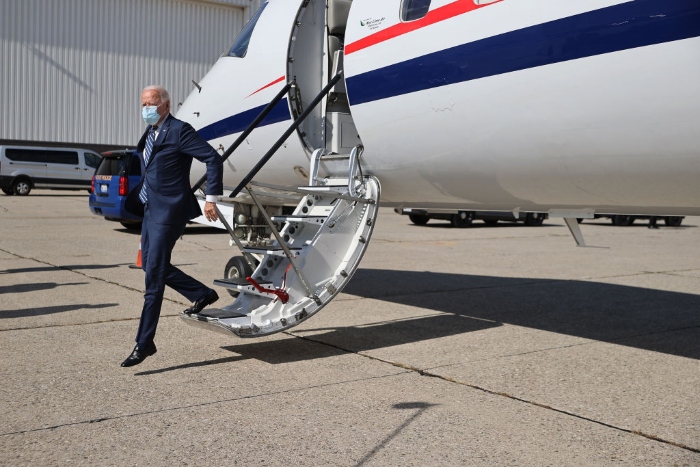 Democratic presidential nominee Joe Biden arrives at Detroit Metropolitan Wayne County Airport for a day of campaigning in Romulus, Mich.