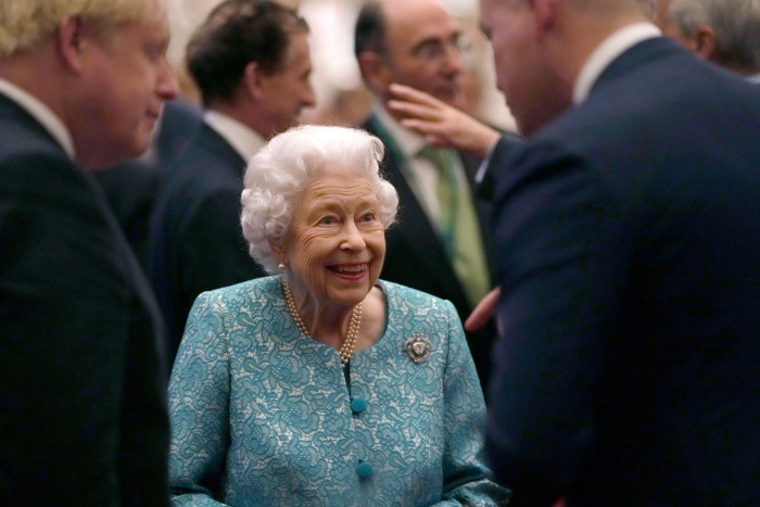 Nightly 10-26-21 photo 2 Britain's Queen Elizabeth II and Prime Minister, Boris Johnson greet guests during a reception at Windsor Castle.