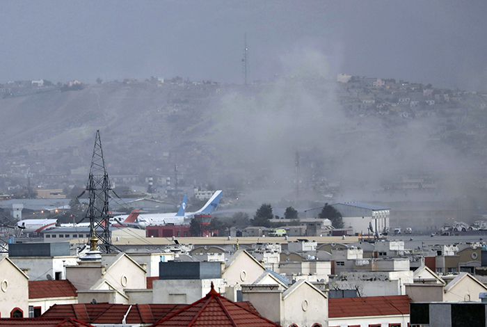 20210826-Afghanistan explosion-AP-700 Smoke rises from a deadly explosion outside the airport in Kabul.