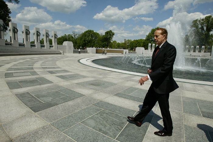Nightly 12-6-21 photo 3 Former Sen. Bob Dole visits the World War II Memorial in 2004 in Washington, D.C.