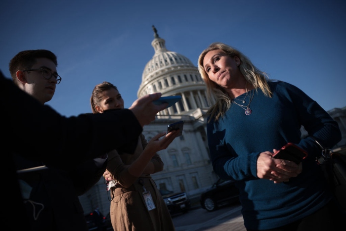 Nightky 11-29-21 photo Rep. Marjorie Taylor Greene (R-Ga.) answers questions in front of the House steps.