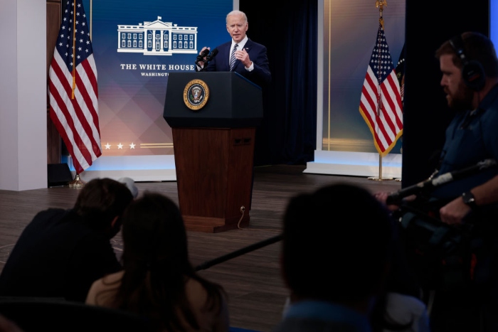 President Joe Biden answers questions from reporters after giving remarks on gas prices in the United States from the South Court Auditorium of the White House.