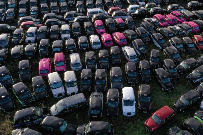 Around 200 of London's black taxi cabs are stored in a field in Epping, England. Many black cab drivers across the capital have lost work, because of the pandemic. According to the Licensed Taxi Drivers' Association, around 80 percent of black cabs have come off the road since June due to the lack of customers. 