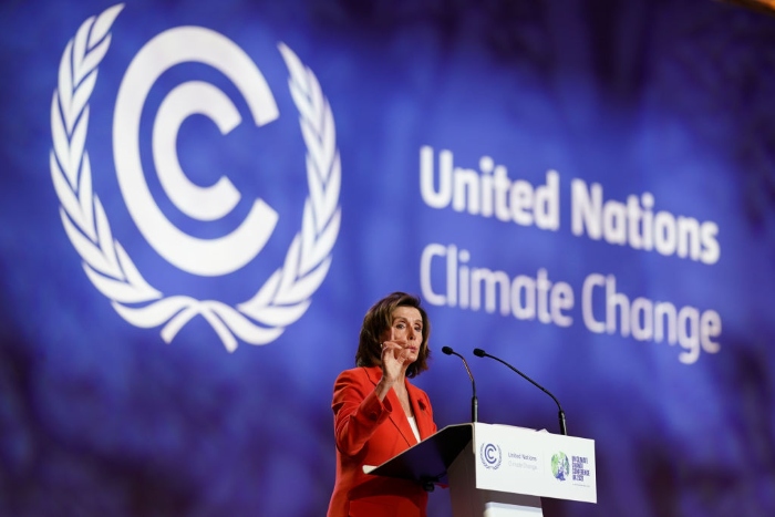 Nightly 11-9-21 photo 3 House Speaker Nancy Pelosi speaks on stage during COP26 in Glasgow, Scotland.