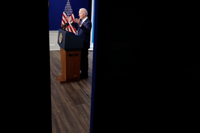 Nightly 1-18-22 photo President Joe Biden delivers remarks about the work being done by his administration to implement the Bipartisan Infrastructure Law in the Eisenhower Executive Office Building's South Court Auditorium.