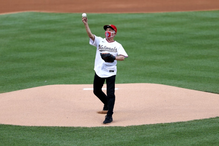 Anthony Fauci, director of the National Institute of Allergy and Infectious Diseases, throws out the ceremonial first pitch prior to the game between the New York Yankees and the Washington Nationals at Nationals Park in Washington.