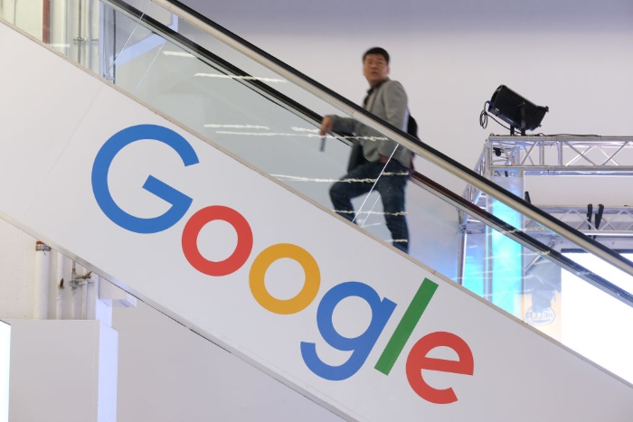 The Google logo on a staircase