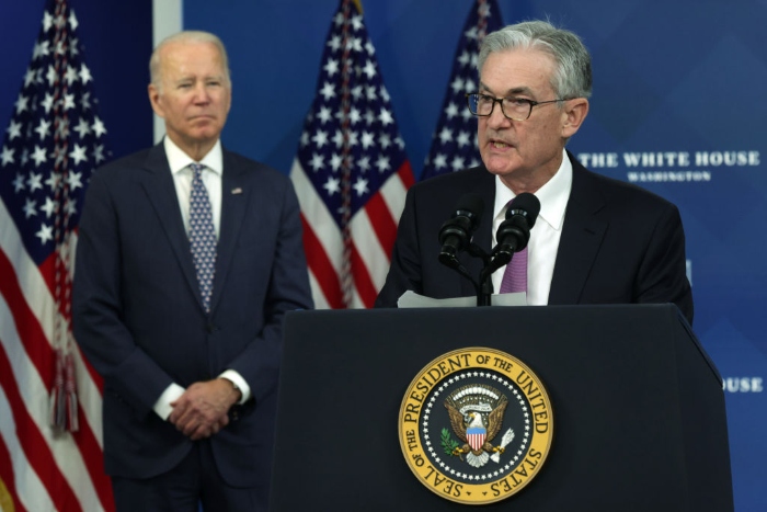 Nightly 11-22-21 photo Federal Reserve Board Chair Jerome Powell speaks as President Joe Biden listens during an announcement at the South Court Auditorium of Eisenhower Executive Office Building.