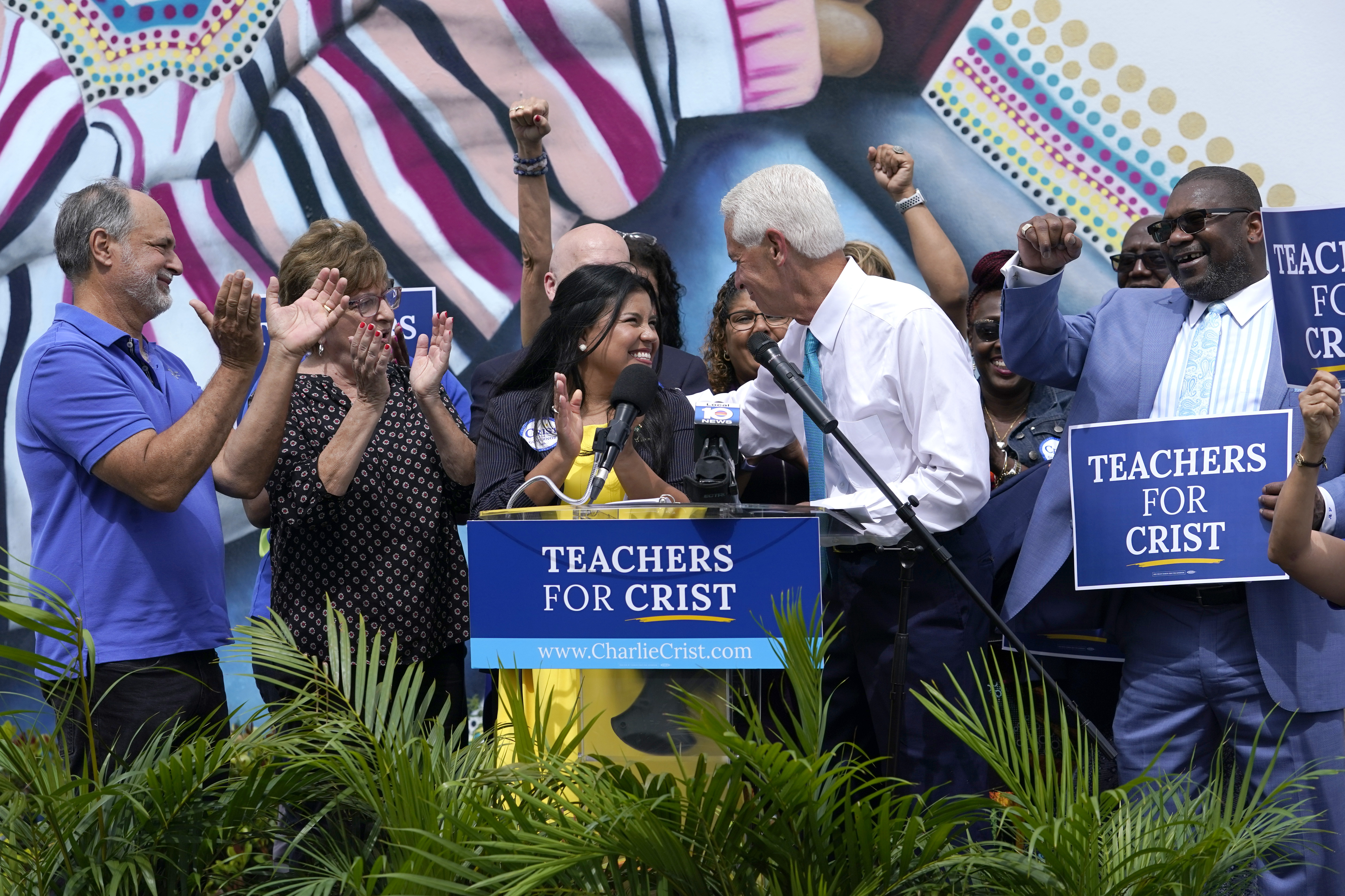 Charlie Crist,second from right, stands with United Teachers of Dade President Karla Hernandez-Mats.