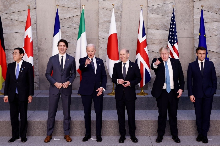 Japan's Prime Minister Fumio Kishida, Canada's Prime Minister Justin Trudeau, U.S. President Joe Biden, Germany's Chancellor Olaf Scholz, British Prime Minister Boris Johnson and France's President Emmanuel Macron pose for a G-7 leaders' family photo during a NATO summit in Brussels, Belgium.