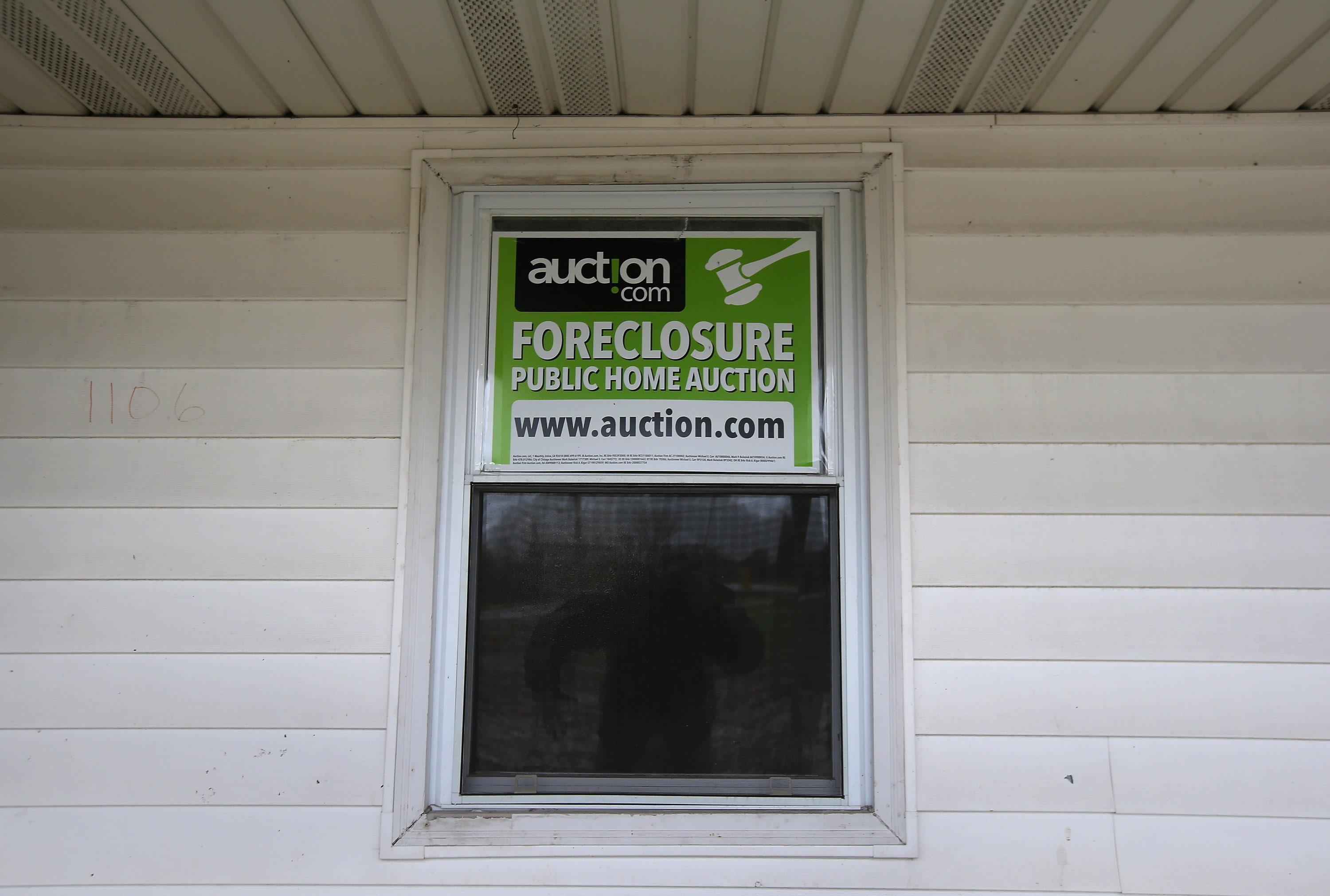 A sign hangs in the window of a foreclosed house in Ohio in 2012, in the wake of the 2008 recession. 